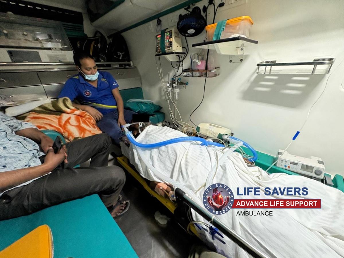 Paramedic Team in Road Ambulance